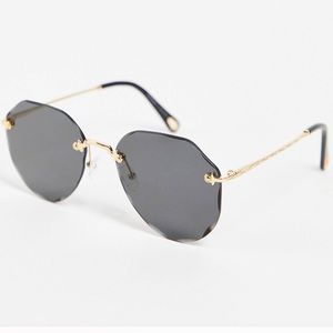 AJ Morgan women's round sunglasses in gold with black lenses